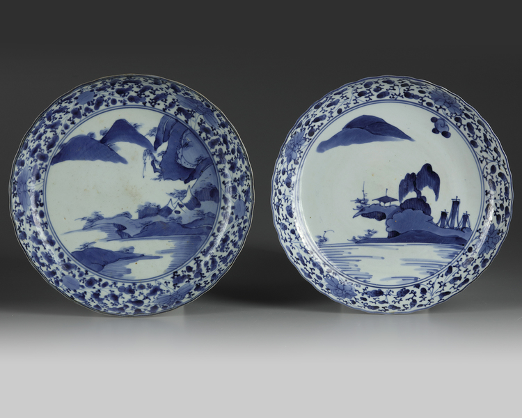 A matched pair of Japanese arita 'landscape' dishes