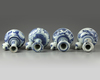 A group of blue and white Japanese Arita kendi's