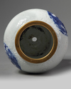 A rare Chinese moulded white-ground blue and white 'dragon' vase