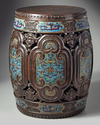 A pair of Chinese cloisonné enamel-inset zitan garden seats