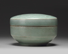 A KOREAN CELADON-GLAZED 'PEONIES' ROUND BOX AND COVER