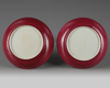 A pair of Chinese famille rose ruby-back 'bird and flower' dishes