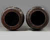 A pair of Chinese cloisonné enamel-inset zitan garden seats