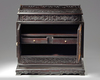 A small Chinese carved zitan cabinet