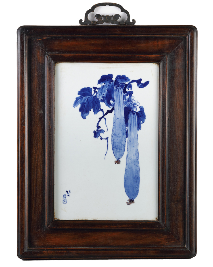 A Chinese blue and white and copper red 'gourds' plaque