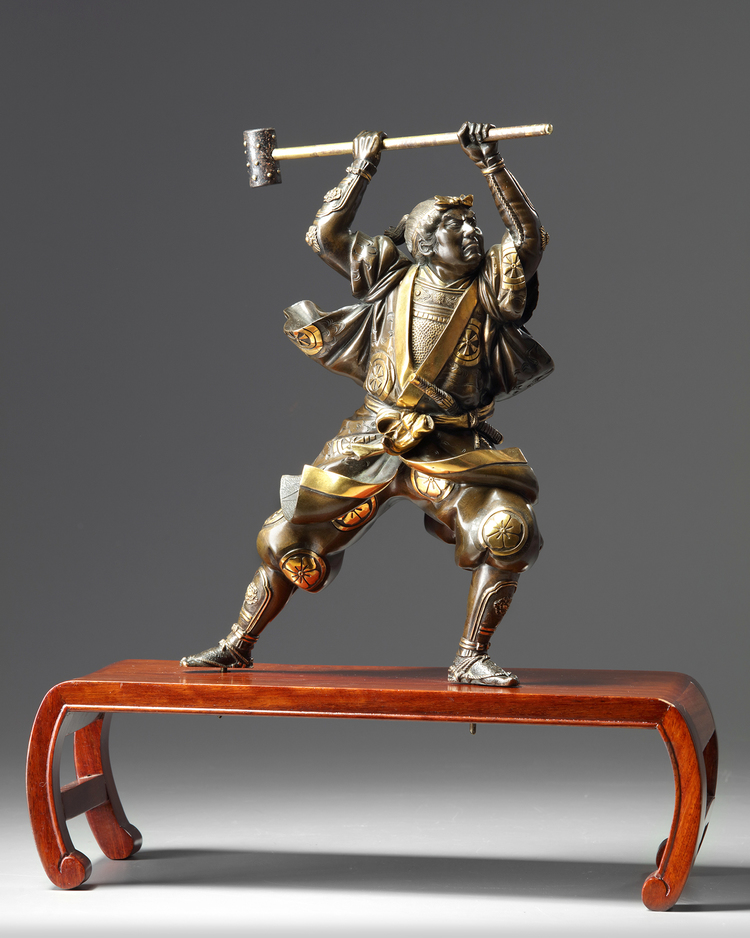A Japanese bronze statue of a samurai