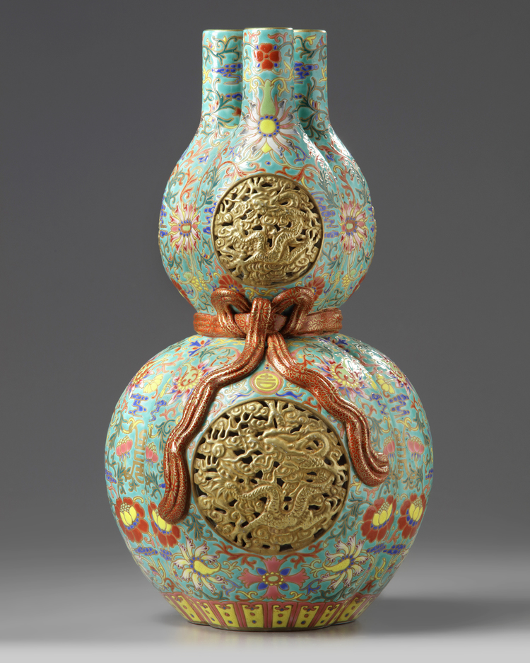 A Chinese famille rose triple gourd vase