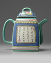 A Chinese famille rose enamelled yixing teapot and cover
