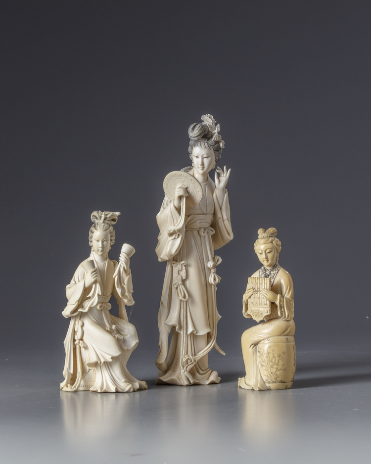 Three Chinese ivory carvings of a lady