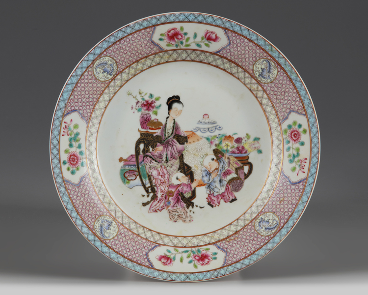 A Chinese famille rose ruby-back 'lady & boys' dish