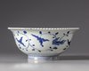 A JAPANESE BLUE AND WHITE BOWL DEPICTING A FU DOG,19TH CENTURY