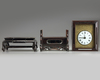 A Chinese gilt bronze table clock in a hongmu case and stand