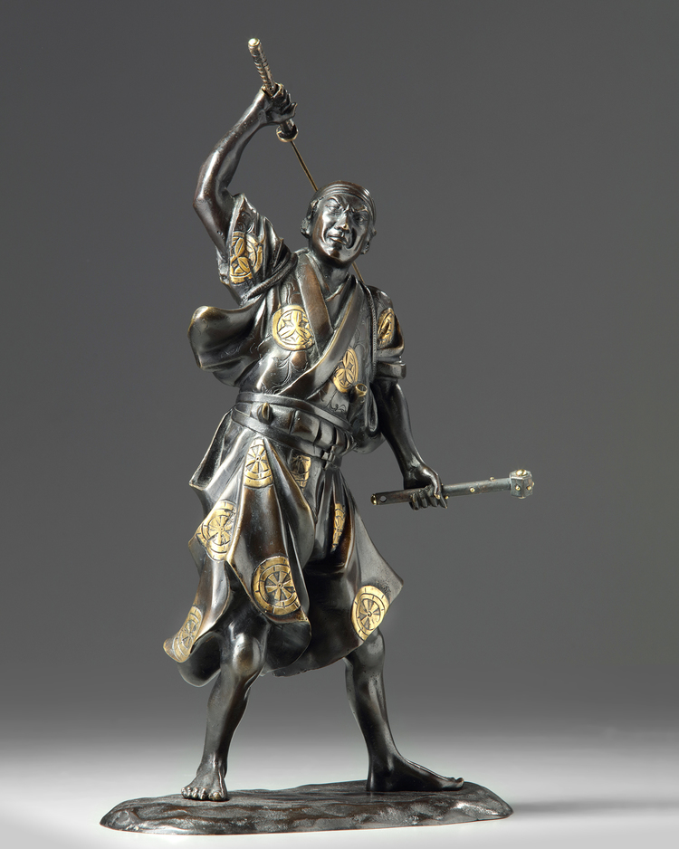 A Japanese bronze figure of a samurai