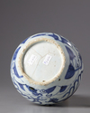 A silver-mounted Chinese blue and white ‘dragon’ double gourd vase