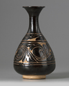 A Chinese black-ground Cizhou-carved bottle vase, yuhuchunping
