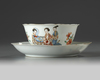 A Chinese famille rose ‘lady and boy’ lobed bowl and saucer