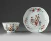 A Chinese famille rose ‘lady and boy’ lobed bowl and saucer