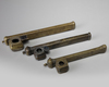 Three Armenian copper pen holders and inkwells