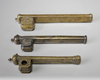 Three Armenian copper pen holders and inkwells