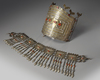 A silver inlaid and gilt tribe headdress and a necklace