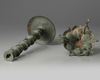 An Islamic bronze oil lamp stand