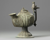 An Islamic bronze oil lamp
