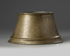 A brass Mamluk candle base