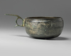 A bronze Seljuq cup with handle
