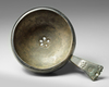 A bronze Seljuq cup with handle