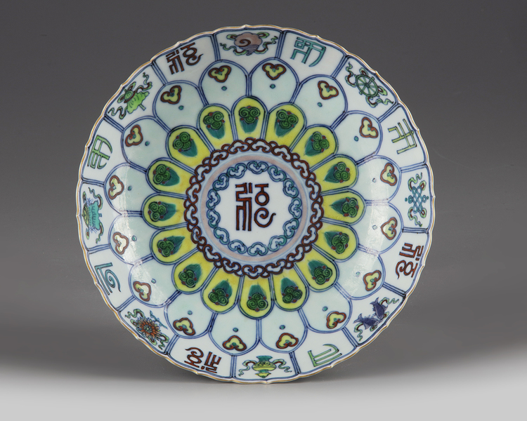 A CHINESE DOUCAI LOTUS-FORM DISH, QING DYNASTY (1644-1911)