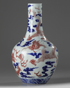 A CHINESE UNDERGLAZE COPPER-RED AND BLUE DECORATED  'DRAGON' VASE