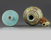 A CHINESE YELLOW-GROUND FAMILLE ROSE TIBETAN STYLE EWER, PENBA HU, QING DYNASTY (1644-1911)