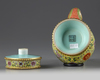 A CHINESE YELLOW-GROUND FAMILLE ROSE TIBETAN STYLE EWER, PENBA HU, QING DYNASTY (1644-1911)