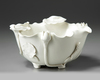 A Dehua white-glazed 'lotus' bowl