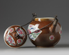 A Chinese cafe au lait ground famille rose 'Batavia ware' teapot and cover