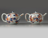 A PAIR OF CHINESE IMARI 'FLORAL' TEAPOTS AND COVERS, KANGXI PERIOD (1662-1722)