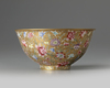 A Chinese gilt-ground famille rose bowl