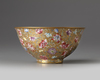A Chinese gilt-ground famille rose bowl