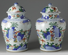 A pair of Chinese wucai vases and covers