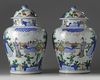 A pair of Chinese wucai vases and covers