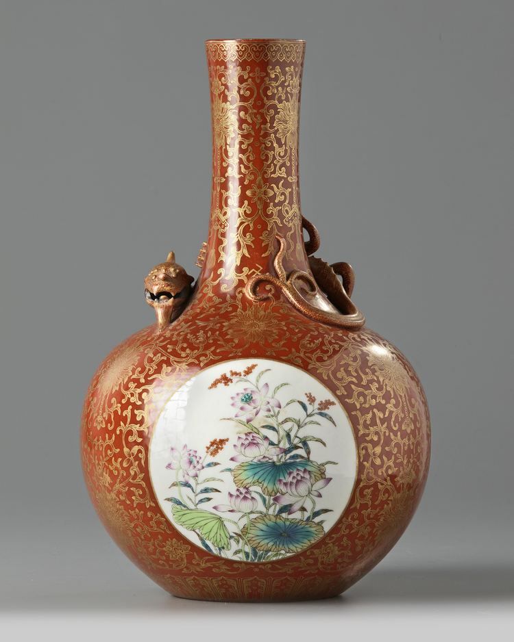 A Chinese coral-ground famille rose 'qilin' vase