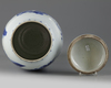 A Chinese blue and white 'figural' jar and cover