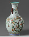 A Chinese famille rose ‘pomegranates’ bottle vase