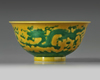 A CHINESE YELLOW-GROUND GREEN-ENAMELLED DRAGON' BOWL, QIANLONG SEAL MARK IN UNDERGLAZE BLUE AND OF THE PERIOD 1736-1795