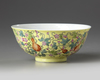 A Chinese yellow-ground famille rose 'gourds' bowl