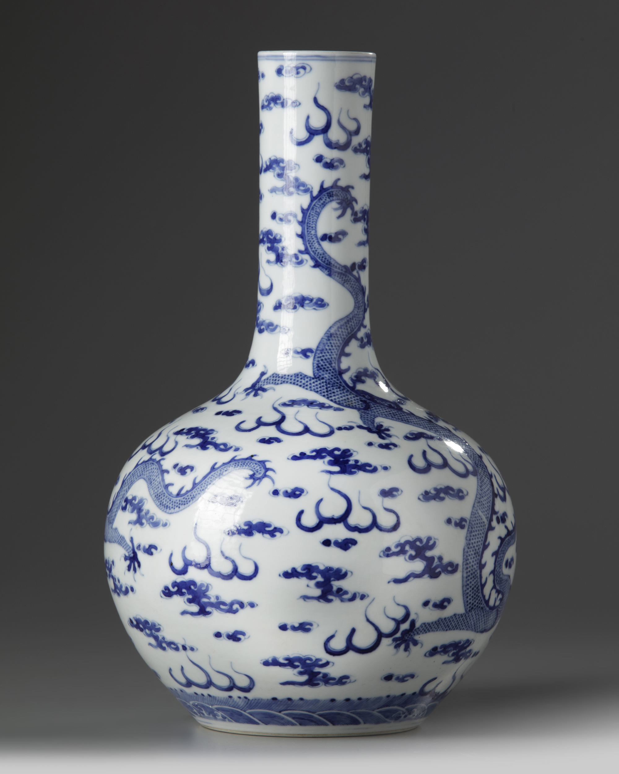 A Chinese blue and white 'dragon' bottle vase