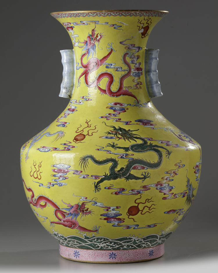 A Chinese yellow-ground famille rose 'nine dragon' vase, hu