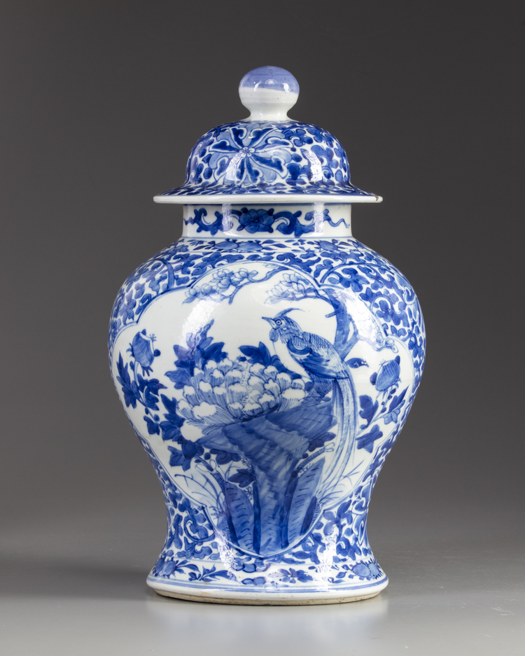 A Chinese blue and white vase with cover