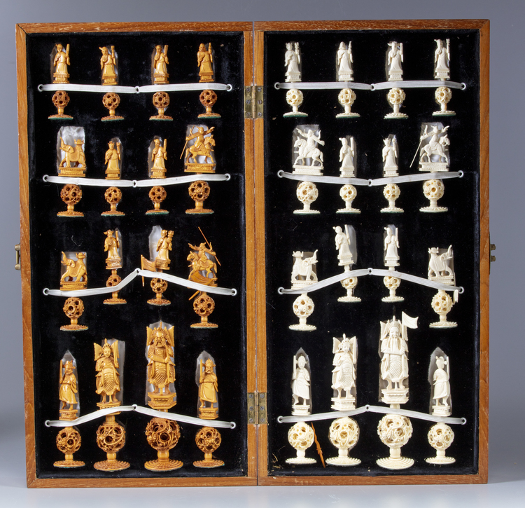 A Chinese wooden chess game with ivory pins