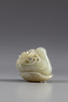 A Chinese celadon jade 'duck and lotus' carving